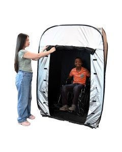 Gray black Enablemart Blackout Sensory tent with a person on wheelchair inside & another person standing outside; holding the entrance flap open.