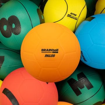 A group of colorful balls that are part of the BRAINball™ Physical Education Cross Curricular System