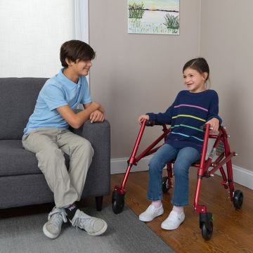 Front view of little girl using Klip Walkers Large and Medium