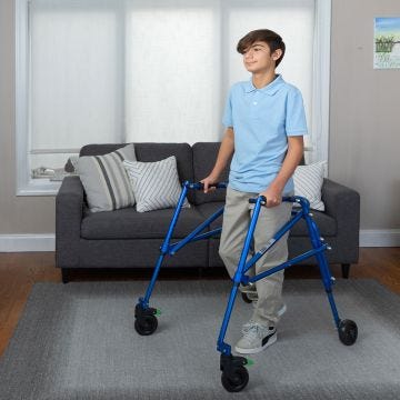 Front view of boy using Klip Walker Large and Medium