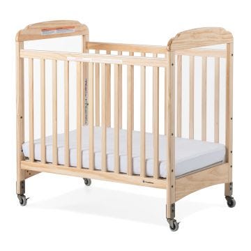 natural wood serenity fixed side clearview crib with a crib mattress
