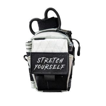 firefly alpine wrx pouch with the message stretch yourself written on the pouch