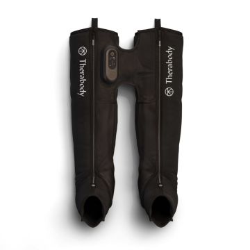 Black; connected Therabody JetBoots Prime with zippers going up the front of both legs and the control panel on the right leg.