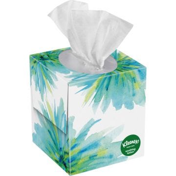 A decorative Kleenex tissue box featuring a beautiful floral pattern; displayed on a clean white background.
