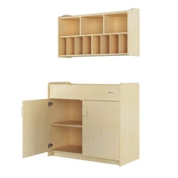 Almond colored changing table and wall mounted diaper organizer.