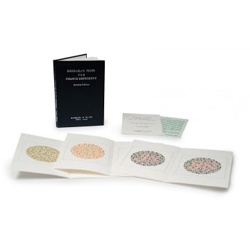 A black book for testing color deficiency with four examples of colored testing circles with numbers in the middle of each.