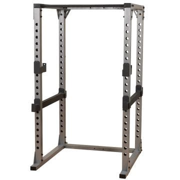 A large steel weightlifting rack with 3-in x 3-in vertical support columns Two black safety bars run parallel, one on each side.