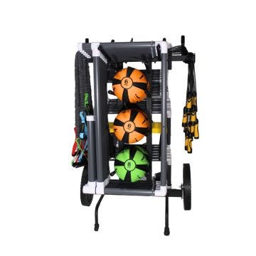 A black and white modular storage rack on wheels, loaded with resistance bands, agility jump ropes, and medicine balls with numbers printed on them.
