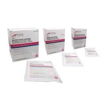 Angle view of School Health sterile gauze pads in different size boxes with packaged gauze pads displayed in front of each box