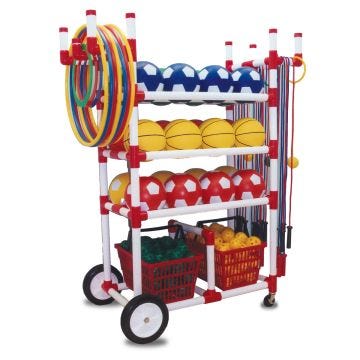 Multi-shelf rolling PE equipment cart made of white and red plastic tubing, fully stocked with colorful sports balls, hoops, jump ropes, and plastic ball crates for organized storage in a gymnasium setting.