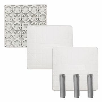 The 3 white molded rubber base set with (1)base down side view designed with circular groves for firmer use in longer run included with 3 steel male ground anchors