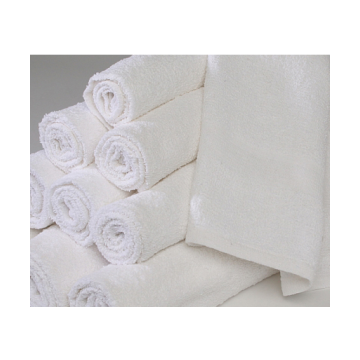 a dozen of rolled white economy select hand towels