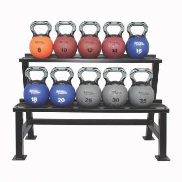 A set of kettlebells organized on a two-tier black metal storage rack. The kettlebells are color-coded and labeled with their weight in pounds, ranging from 8 to 35 pounds.
