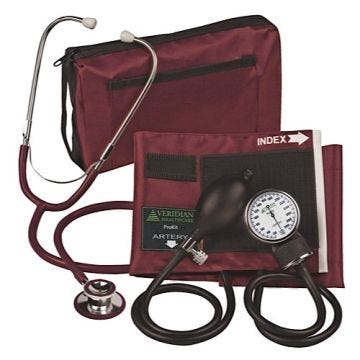 a burgundy prokit aneroid sphygmomanometer with a dual head stethoscope