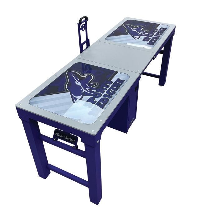 Square folded up sideline cart showing Chief Leschi logo; colors, and mascot name on the side. Square folded up sideline cart showing Chief Leschi logo; colors, and mascot name on the side.