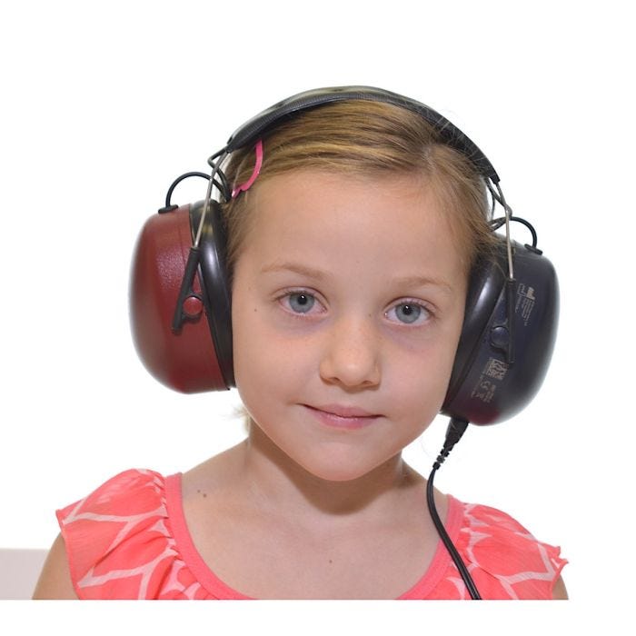 Young girl with MAICO DD65 v2 Circumaural Headset, left red, right black.
