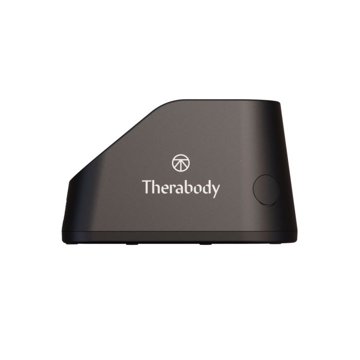 Charging station for the Theragun PRO Plus with the Therabody logo on the side.