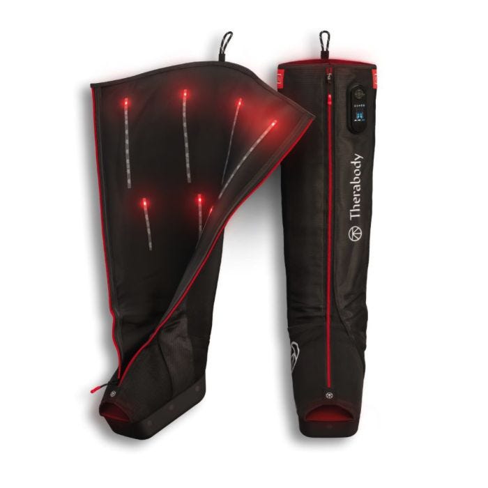 Pair of Therabody JetBoots with one open to show the infrared strips on the inside and one closed to show the outside zipper; LCD screen and boot shape. Pair of Therabody JetBoots with one open to show the infrared strips on the inside and one closed to show the outside zipper; LCD screen and boot shape.