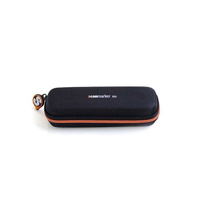 Black rectangular case with orange zipper Black rectangular case with orange zipper