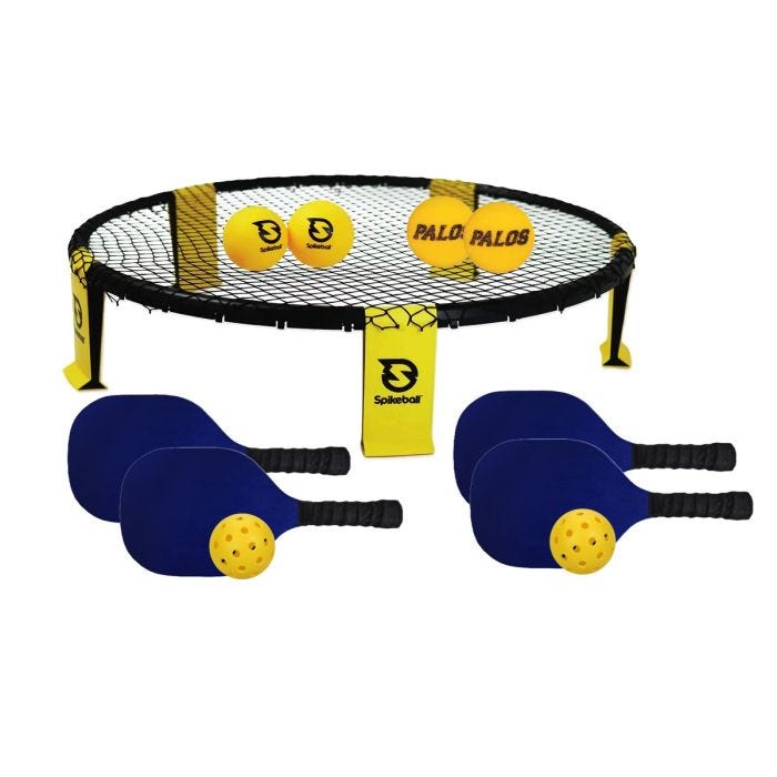 Game set with a Spikeball net; four yellow balls; four blue pickleball paddles; and two perforated yellow plastic balls. Game set with a Spikeball net; four yellow balls; four blue pickleball paddles; and two perforated yellow plastic balls.