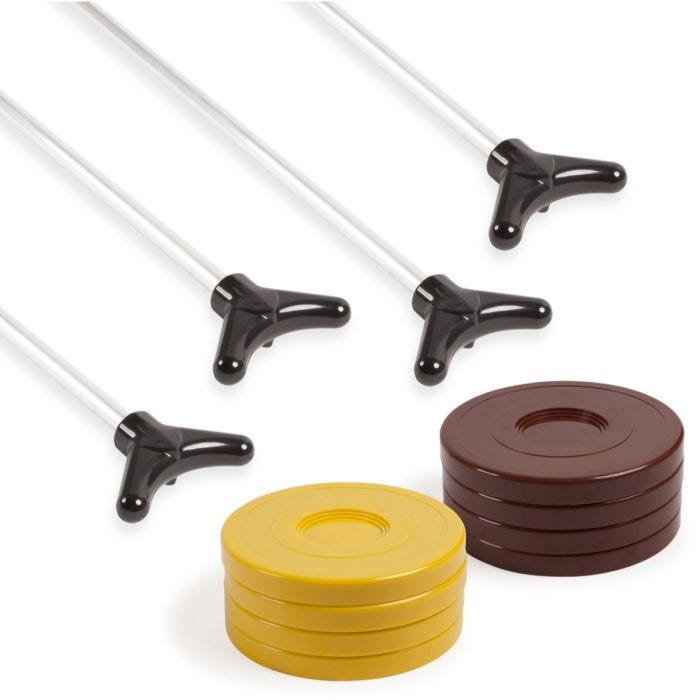 A set of four white poles with black T-shaped handles and two stacks of discs in yellow and brown. A set of four white poles with black T-shaped handles and two stacks of discs in yellow and brown.