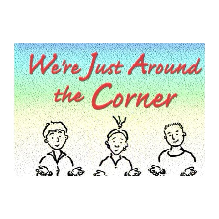 Illustration with a blue, green, and yellow gradient background and red cursive text that reads "We're Just Around the Corner," above three cartoon-style characters with open hands and friendly expressions. Illustration with a blue, green, and yellow gradient background and red cursive text that reads "We're Just Around the Corner," above three cartoon-style characters with open hands and friendly expressions.