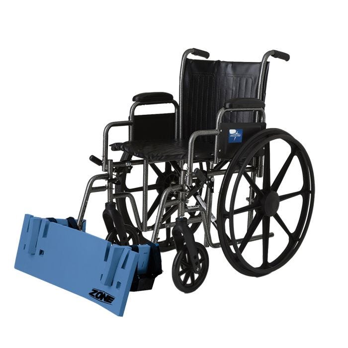 A rectangular blue pad attached across the front lower footrests of a standard manual wheelchair. A rectangular blue pad attached across the front lower footrests of a standard manual wheelchair.