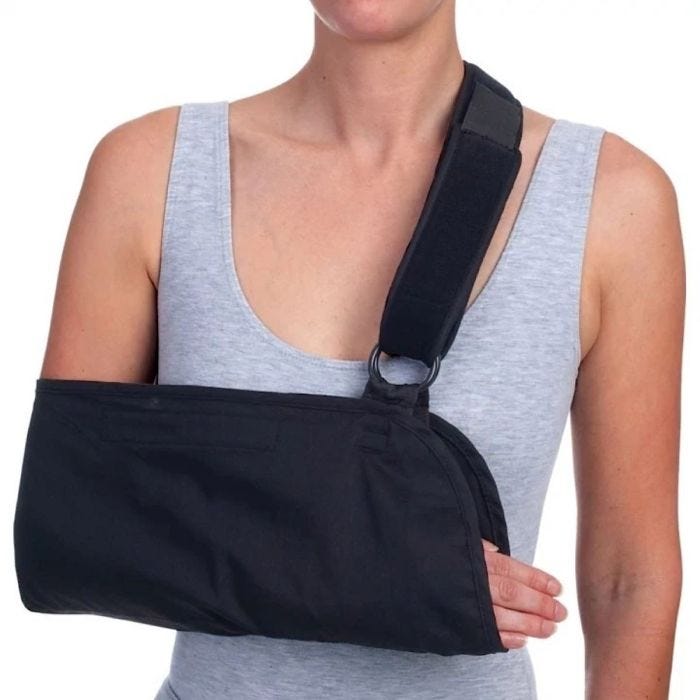 Black universal arm sling with adjustable padded shoulder strap. Black universal arm sling with adjustable padded shoulder strap.
