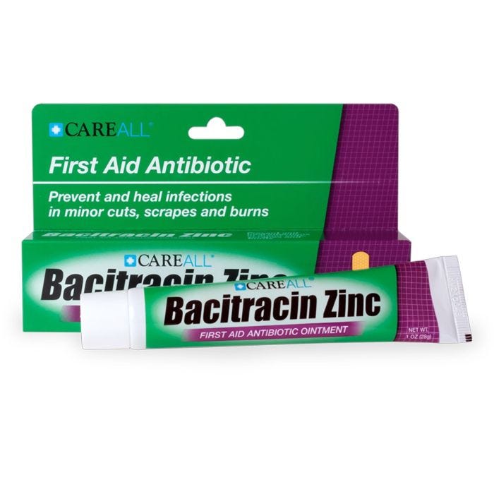 A green tube and box of 'CareAll Bacitracin Zinc First Aid Antibiotic Ointment.' The text on the box reads: 'First Aid Antibiotic. Prevent and heal infections in minor cuts, scrapes, and burns.' The tube has similar labeling with the brand name 'CareAll' A green tube and box of 'CareAll Bacitracin Zinc First Aid Antibiotic Ointment.' The text on the box reads: 'First Aid Antibiotic. Prevent and heal infections in minor cuts, scrapes, and burns.' The tube has similar labeling with the brand name 'CareAll'