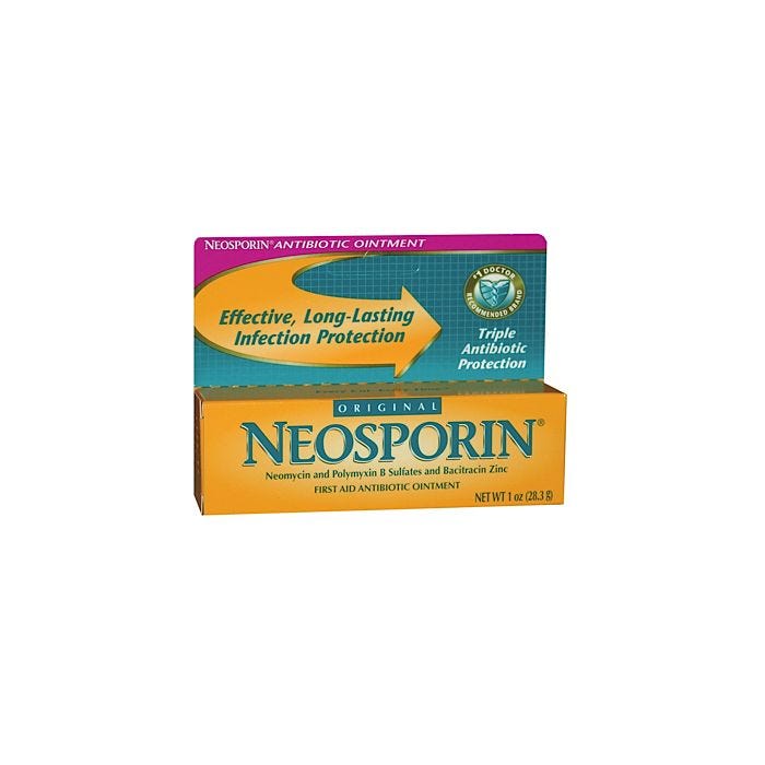 A yellow and green box with words Neosporin Ointment single pack, 1 oz. A yellow and green box with words Neosporin Ointment single pack, 1 oz.