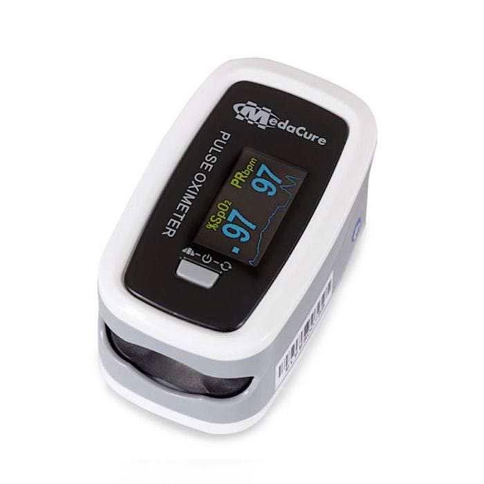 Top view of MedaCure Fingertip Pulse Oximeter featuring digital screen displaying SpO2/PRbpm readings in lateral view Top view of MedaCure Fingertip Pulse Oximeter featuring digital screen displaying SpO2/PRbpm readings in lateral view